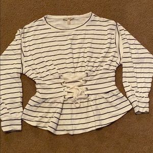 Black and white peplum top.